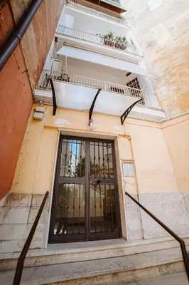 an overhead view of a building with a window and stairs at Casa Gioia - Metro Garbatella in Rome