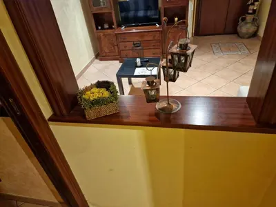 a view of a living room with a table at A 2 passi dal cuore di Roma in Rome