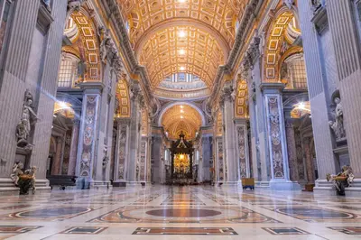 a large room with a large building with a ceiling at Maison Carlotta In Vatican in Rome