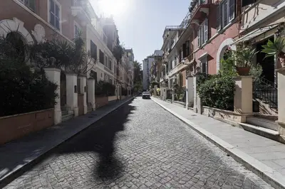 a cobblestone street in a city with buildings at 
