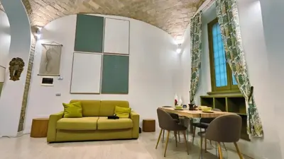 a bathroom with a sink and a wall at LOFT49 in Rome