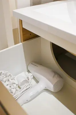 a pair of white shoes sitting in a drawer at Casa Pesa 2 rooms 2 baths Rome center in Rome
