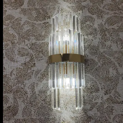 a glass chandelier hanging from a wall at Buongiorno al Vaticano in Rome