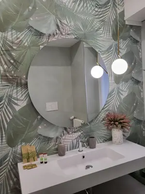 a bathroom with a sink and a mirror at Buongiorno al Vaticano in Rome
