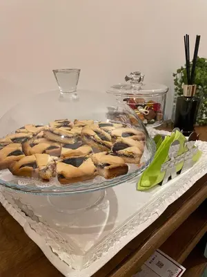 a plate of cookies on top of a table at Termini Suite Inn Rome in Rome