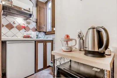 a kitchen with a counter with a blender on it at PANTHEON allo SCRIGNO in Rome