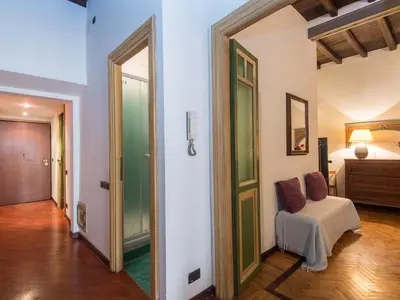 a hallway with a room with a bed and a mirror at Apartment Navona by Interhome in Rome