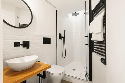 a bathroom with a sink and a toilet and a shower at Pellegrino 113 in Rome