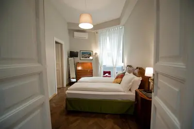 a bedroom with a bed and a window at Cassiodoro19 in Rome