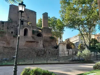 a street light in front of an old castle at Pensiero Romano in Rome