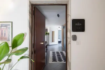 a hallway with a door and a tile floor at Loft 36 by Nosdom Properties in Rome