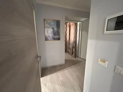 a hallway with a door leading into a room at Accommodation Corallo in Rome
