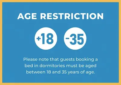 a sign that says age restriction and a bed in donations must be aged between at Hostel Castello Maggiore in Rome