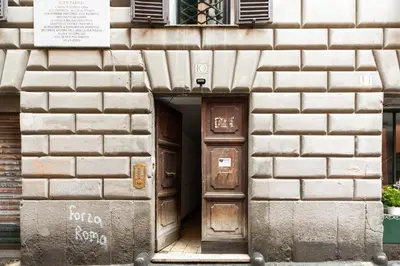 an entrance to a brick building with a door at iFlat Comfy Apartament in Campo de' Fiori in Rome