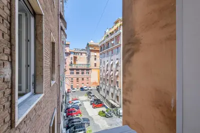 a view of a city street from a building at iFlat Wood and Marble Riverfront in Rome