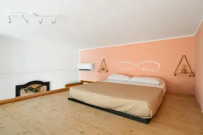a bedroom with a bed and a fireplace at Imperial Nazionale in Rome