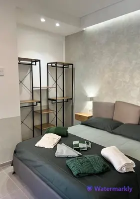a bedroom with a bed with two shelves on it at ITALIANAS Vatican in Rome