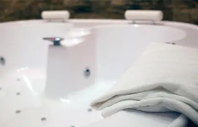 a close up of a white sink with a towel at Piccolo di Piazza di Spagna Suites in Rome