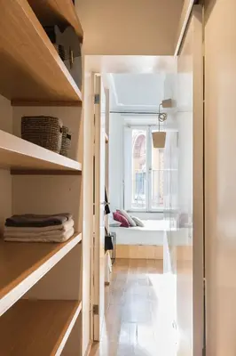 a room with a window and a room with a bed at Mami's Home Monti in Rome