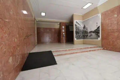a large empty room with a brick wall at Pochi passi da San Pietro Metro A Cipro in Rome