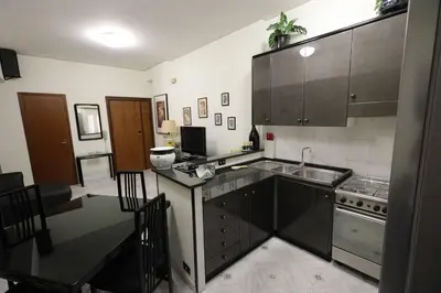 a kitchen with a sink and a counter top at Pochi passi da San Pietro Metro A Cipro in Rome