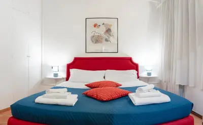 a bedroom with a bed with towels on it at Casa De' Medici in via Giulia in Rome