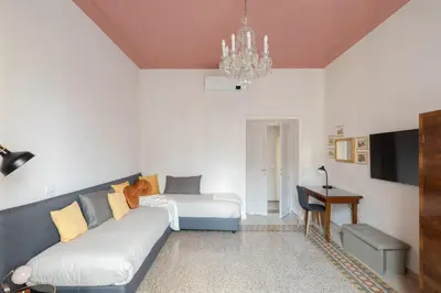 a living room with a couch and a tv at New apartment with amazing view of S Peter's Dome in Rome