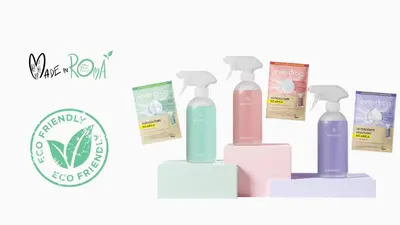 a set of three bottles of soap with a logo at Studio d'Artista, Elegante Loft nel Cuore di Roma in Rome