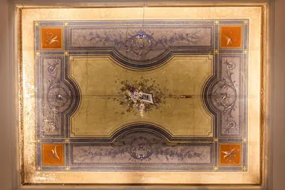 a painting of a table with a vase on it at Cavour LR Collection in Rome