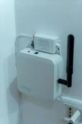 a white appliance with a wessex box on a wall at Monti Wood Loft in Rome