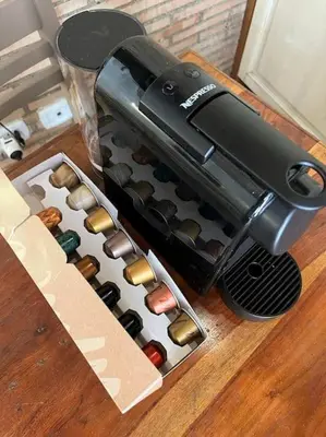 a toaster oven sitting on top of a table at Monti Wood Loft in Rome