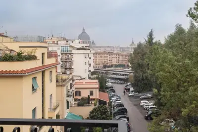 a view of a city with cars parked on a street at Magenta Collection Terrione 25 in Rome