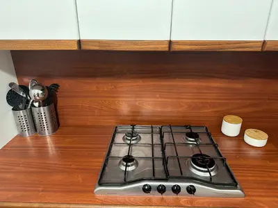 a stove top oven sitting on top of a kitchen counter at La casetta a monti in Rome