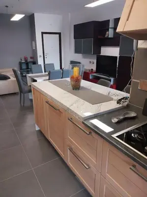a kitchen with a counter with a vase on it at j u b i l e h o u s e R o m e in Rome