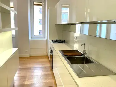 a kitchen with a sink and a counter top at Il Nido Apartment in Rome