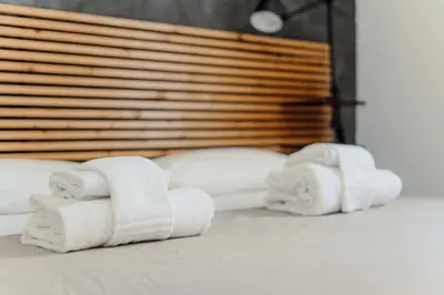 a group of towels sitting on top of a bed at Valentine's Dream in Rome