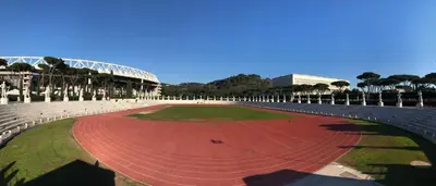 a stadium with a red track in front of a stadium at Maison Flaminio in Rome