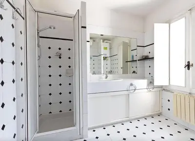 a bathroom with a shower and a sink at Appartamento Coronari in Rome