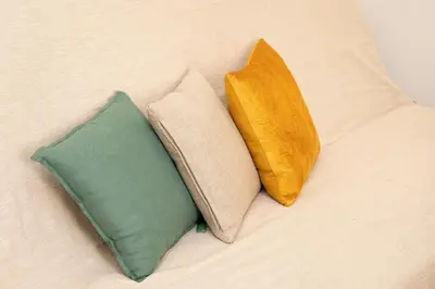 two pillows sitting on top of a bed at Vatican Museum by Rental in Rome in Rome
