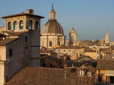 a view of a city with roofs and buildings at Raffaello Terrace - near Piazza Navona in Rome