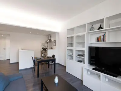 a living room with a large flat screen tv at Apartment Pratolina by Interhome in Rome