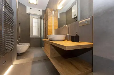 a bathroom with a sink and a toilet at San Pietro Guest House in Rome