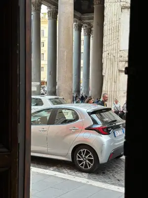 a silver car parked in front of a building at Welcome to Pantheon in Rome