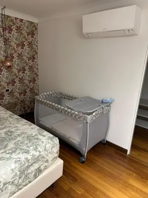 a small room with a bed and a table at Welcome to Pantheon in Rome