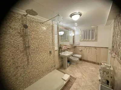 a bathroom with a shower and a toilet and a sink at Welcome to Pantheon in Rome