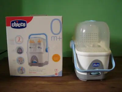a toy kitchen in a box on a table at La Casa Dei Gerani in Rome