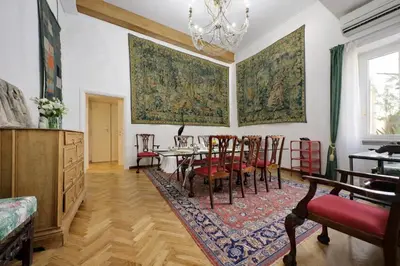 a dining room with a table and chairs at On The Steps in Rome