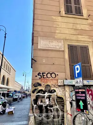 a building with graffiti on the side of it at Upi-Up Rome Staying in Rome
