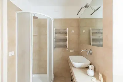 a bathroom with a shower and a sink at iFlat Little & Bright in Trevi in Rome