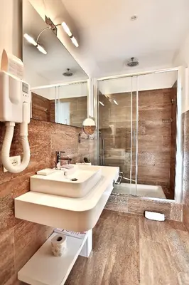 a bathroom with a sink and a shower at Suite Deal in Rome
